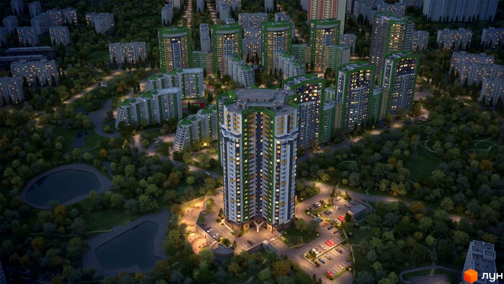 Паркова Вежа - житловий комплекс з високою багатоповерховою будівлею та зеленими зонами навколо. Навколо комплексу розташовані дерева, дороги та парковки з автомобілями.