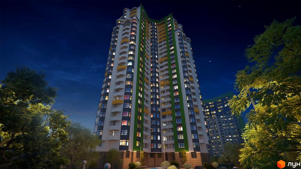 Паркова Вежа - висотна новобудова з яскравим фасадом та зеленими акцентами в нічний час. Навколо будівлі розташовані дерева з вечірнім освітленням.