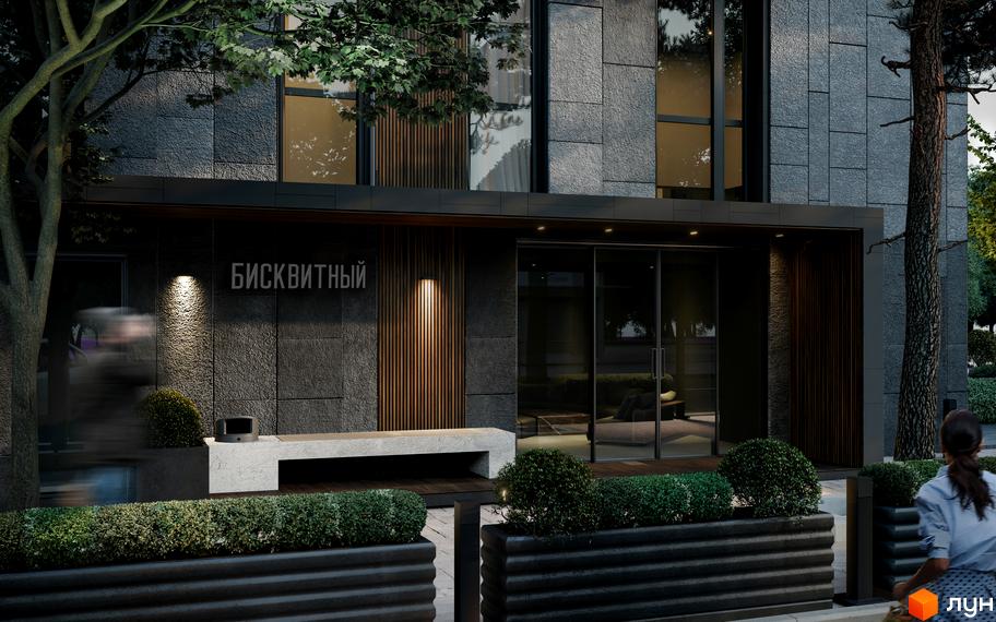 Вхідна група житлового комплексу Бісквітний з фасадом з сірого каменю та дерев'яними елементами. Навколо облаштована прибудинкова територія з кущами та лавкою.
