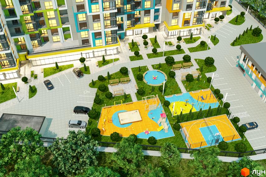 Житловий комплекс Південний з різнокольоровими фасадами та прибудинковою територією з дитячим майданчиком та баскетбольним полем.