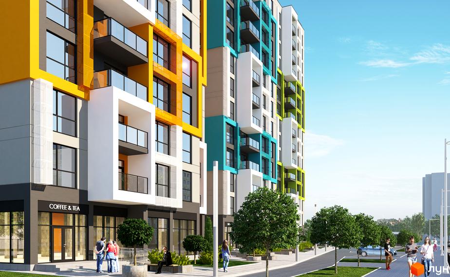 Житловий комплекс Південний - це яскрава новобудова з різнокольоровими фасадами та балконами. Територія навколо будинку упорядкована, з пішохідними доріжками та зеленими насадженнями.