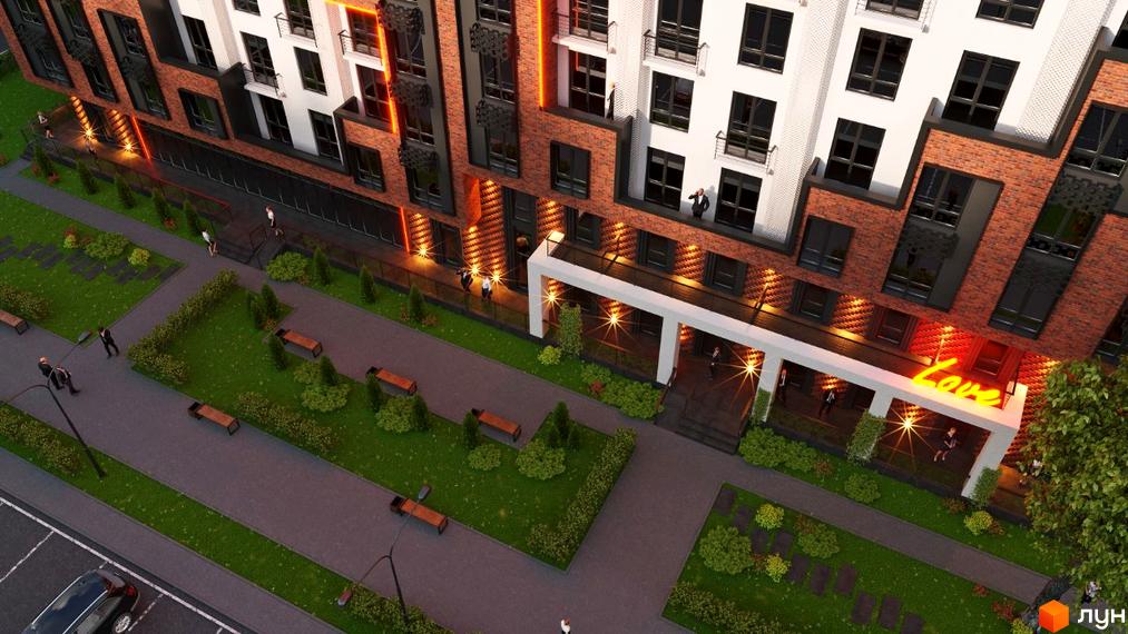 Житловий комплекс Love: будинок з цегляними та світлими фасадами, неоновою вивіскою. Облаштована прибудинкова територія з зеленню та доріжками.