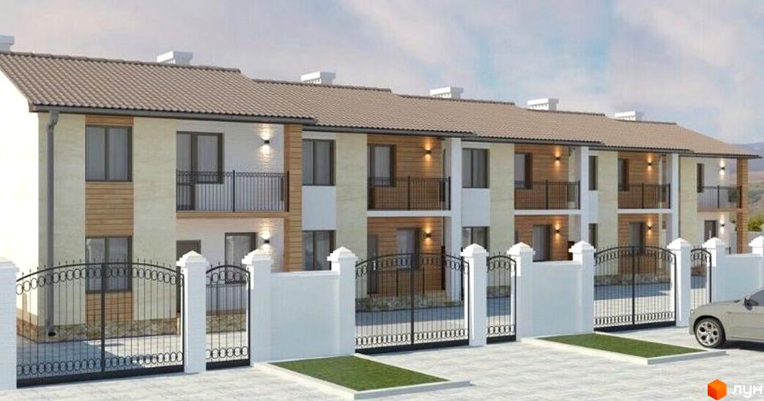 Зображення фасаду будинку Житловий комплекс на вул. Одеська, 4. На передньому плані ковані ворота та паркан, асфальтована прибудинкова територія.