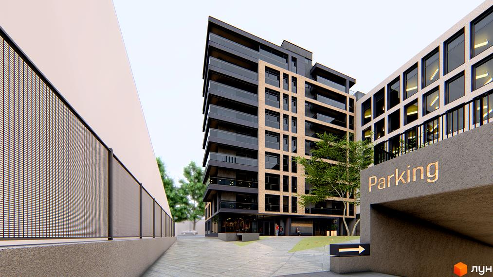 Житловий комплекс Grand Residence. Зовнішній вигляд будівлі з цегляним фасадом та темними балконами. Прибудинкова територія з паркінгом та огорожею.