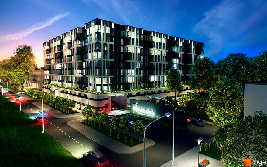 Зображення фасаду ЖК Dubinina вночі. Навколо будинку зелені насадження, освітлені ліхтарі, видно дорогу та автомобілі.