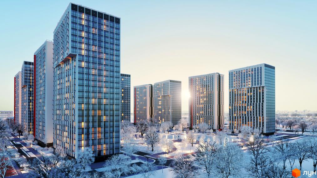 Житловий комплекс Urban Park у Києві взимку. Сучасні висотні будинки з панорамним склінням та освітленими вікнами, оточені засніженими деревами та доглянутими алеями.
