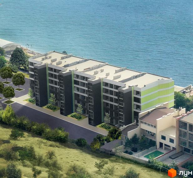 Житловий комплекс MAGNÍT. Будинок на Фонтані з фасадами темного кольору та зеленими вставками, розташований біля моря. Територія навколо будинку озеленена деревами та кущами.