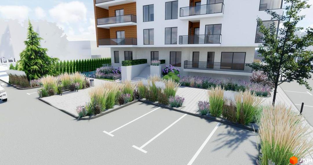 Житловий комплекс Baltiysʹka Hall: білий будинок з балконами. Територія має парковку, зелені насадження та доріжки.