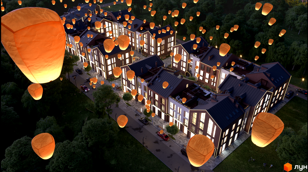 Житловий комплекс Viking Home з нічною ілюмінацією та ліхтарями. Навколо зелені дерева та прибудинкова територія.