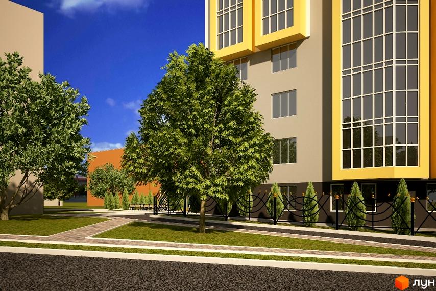 Зображення фасаду будинку Житлового комплексу „Сонячний“ та прибудинкової території з деревами і газоном.