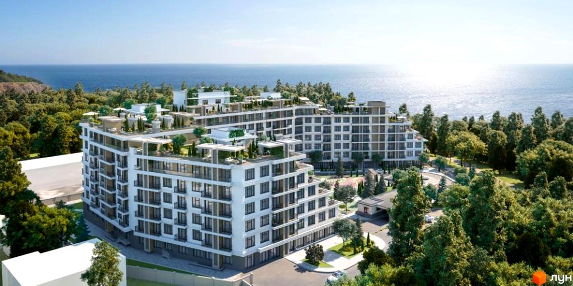 Житловий комплекс MARINIST residence: білі багатоповерхові будинки з терасами та зеленими насадженнями на дахах, розташовані серед лісу біля моря.