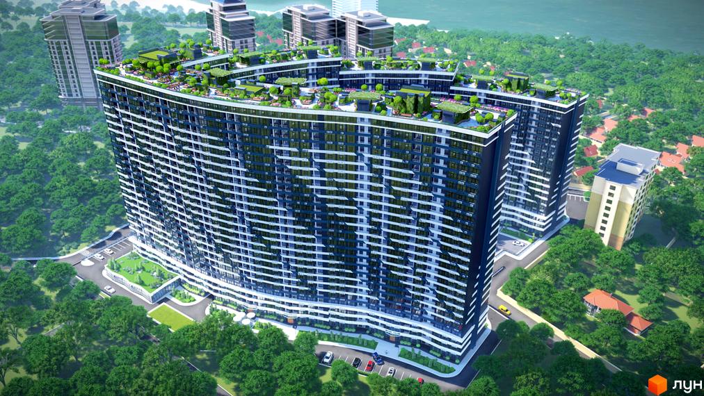 Високоповерховий будинок ЖК Атмосфера з зеленими терасами на даху, поруч дерева та прибудинкова територія з парковкою.