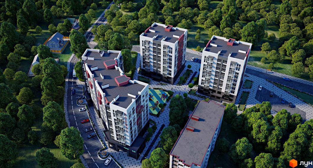 Житловий комплекс Рідний з біло-сірими фасадами та червоними елементами, дитячим майданчиком та зеленими насадженнями. Вид зверху на новобудову та прибудинкову територію.