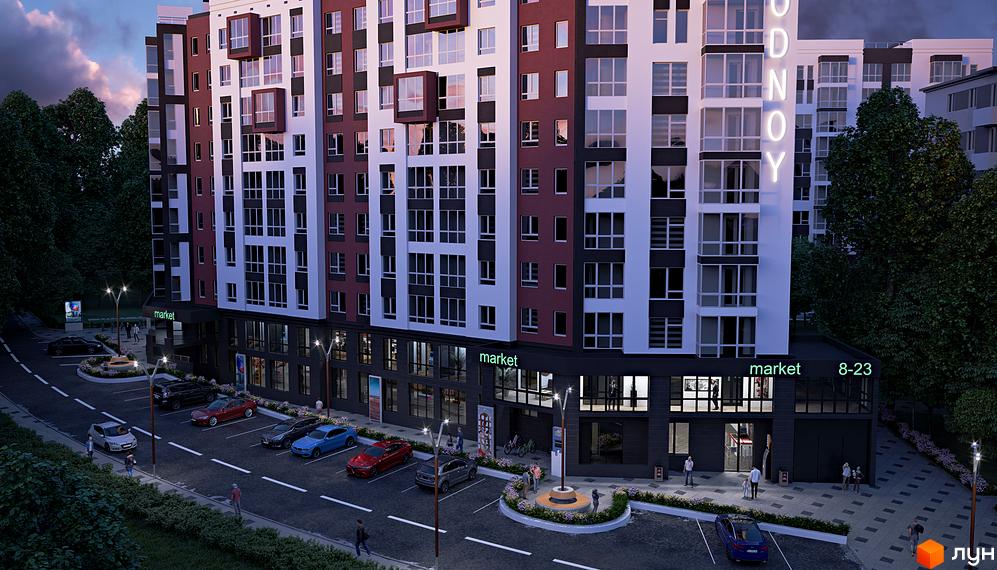 Зовнішній вигляд новобудови ЖК Рідний з парковкою та прибудинковою територією. Комплекс має багатоповерхові секції з вікнами та балконами.