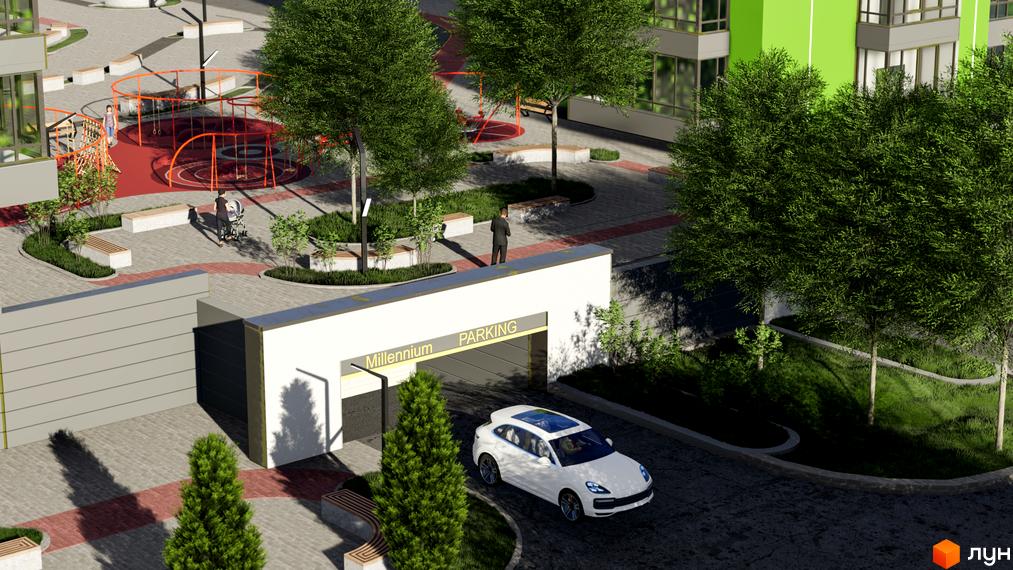 Новобудова Millennium з фасадом зеленого кольору та прибудинковою територією з дитячим майданчиком та місцями для відпочинку.