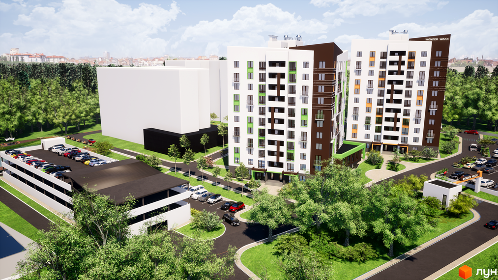 Багатоповерхові будинки Житлового комплексу Wonderwood з білими та коричневими фасадами. Навколо будівель розташовані зелені зони, парковка та під'їзні шляхи.