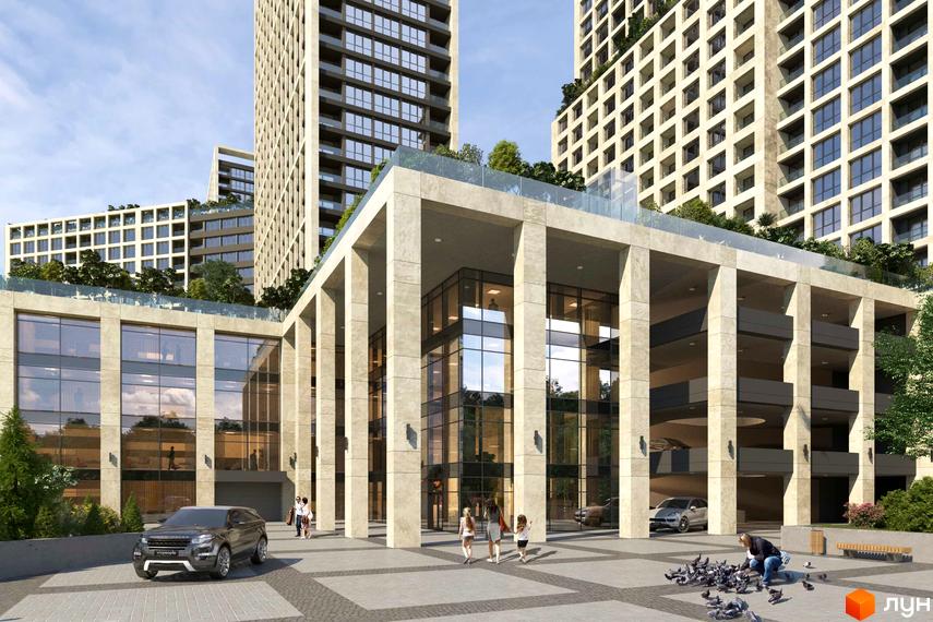 Зовнішній вигляд будівлі ЖК Greenville на Печерську з великими вікнами та колонами. На території комплексу є парковка та тротуарна плитка.