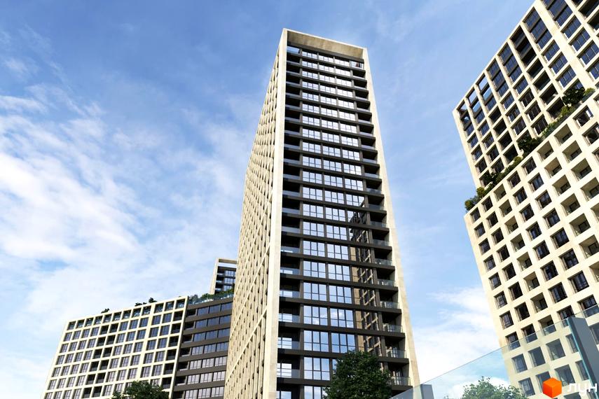 Високі будинки ЖК Greenville на Печерську з великими вікнами та балконами на тлі блакитного неба. Архітектура комплексу підкреслює його сучасний вигляд.