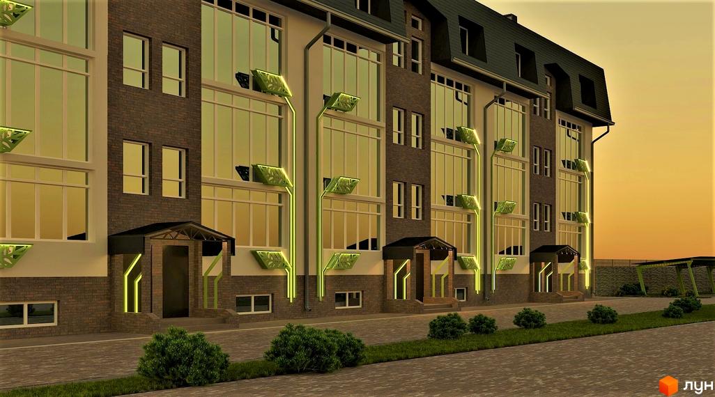 Клубний будинок „Весна на вулиці Осінній“ з цегляним фасадом, великими вікнами та оригінальним освітленням. Навколо будинку облаштована прибудинкова територія з газоном та кущами.