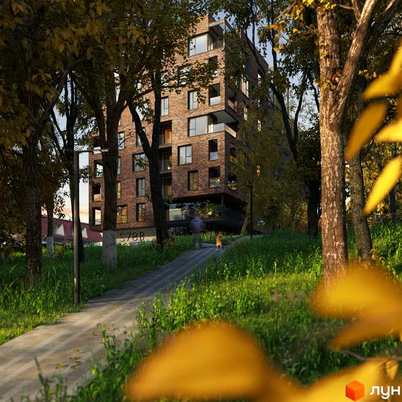 Житловий комплекс S78 з цегляним фасадом серед осіннього парку. Навколо новобудови розташована зелена прибудинкова територія з доріжками та деревами.