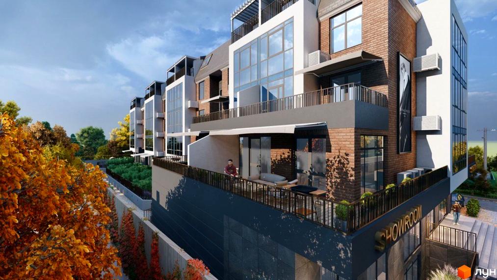 Зображення фасаду будинку ЖК Comfort Hall з терасою, балконом та вивіскою SHOWROOM. Навколо будинку зелені насадження та осінні дерева.