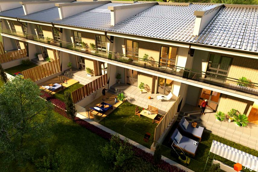 Зовнішній вигляд таунхаусів IF Village з терасами та приватними двориками. На прибудинковій території розташовані зони відпочинку з шезлонгами та столиками.