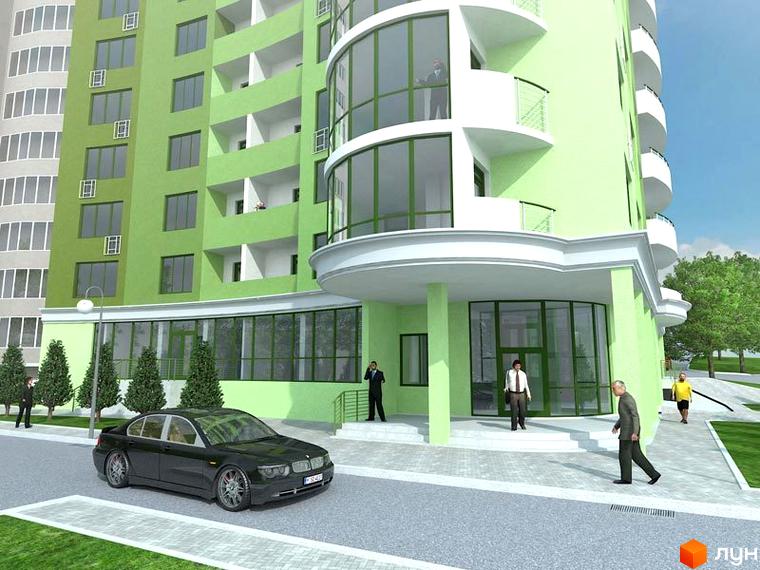 Зовнішній вигляд ЖК Волгоградський з світло-зеленим фасадом та балконами. На прибудинковій території видно дорогу, тротуар та пішоходів.