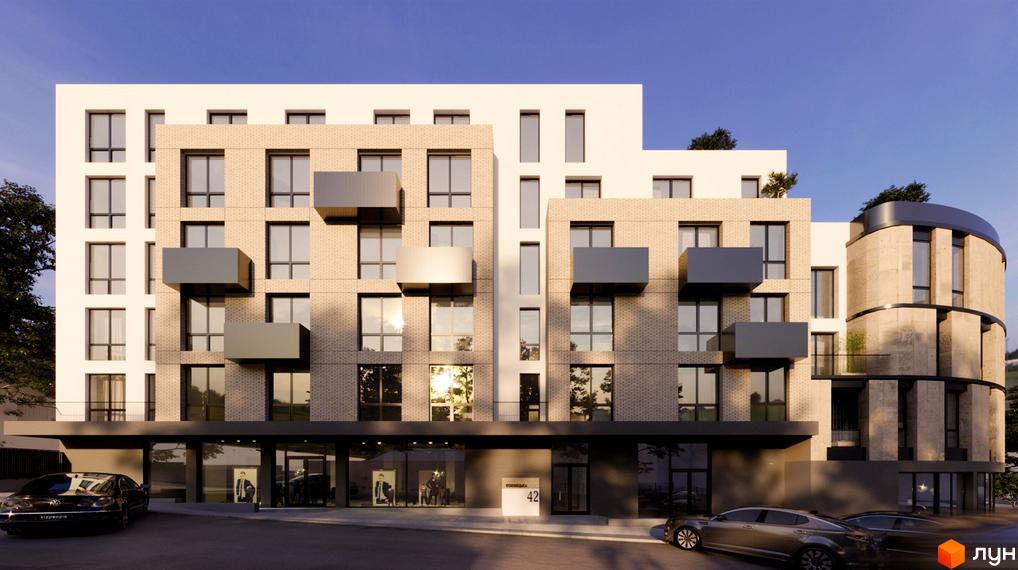 Зовнішній вигляд житлового комплексу Грот з цегляним фасадом, виступаючими балконами та круглою частиною. Навколо будинку розташована прибудинкова територія з автомобілями.