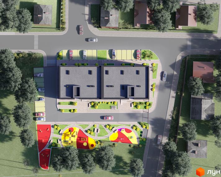 Вид зверху на житловий комплекс Нові Метри Club з двома багатоквартирними будинками та дитячим майданчиком.