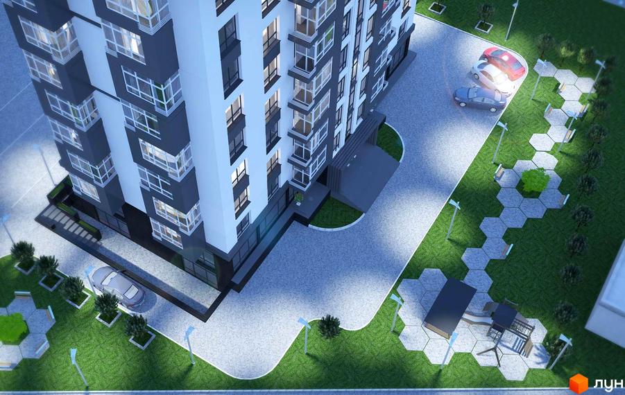 Житловий комплекс Перлина Парку з сірими та білими фасадами, балконами та прибудинковою територією з парковкою, зеленими зонами та доріжками.