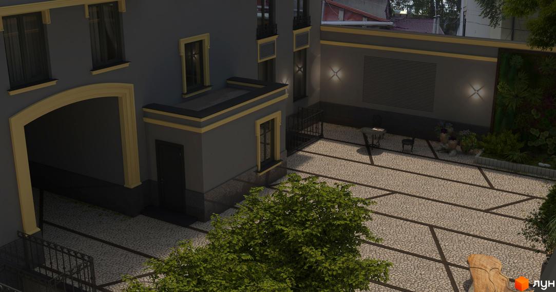 Житловий комплекс Вентімілья із сірим фасадом та жовтими елементами, з брукованою прибудинковою територією та зеленими зонами.