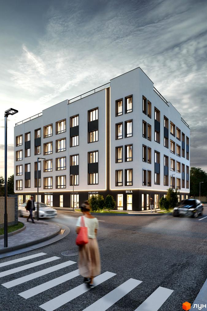 Зображення фасаду чотириповерхового будинку Житлового комплексу G-51 з магазинами на першому поверсі та пішохідним переходом.