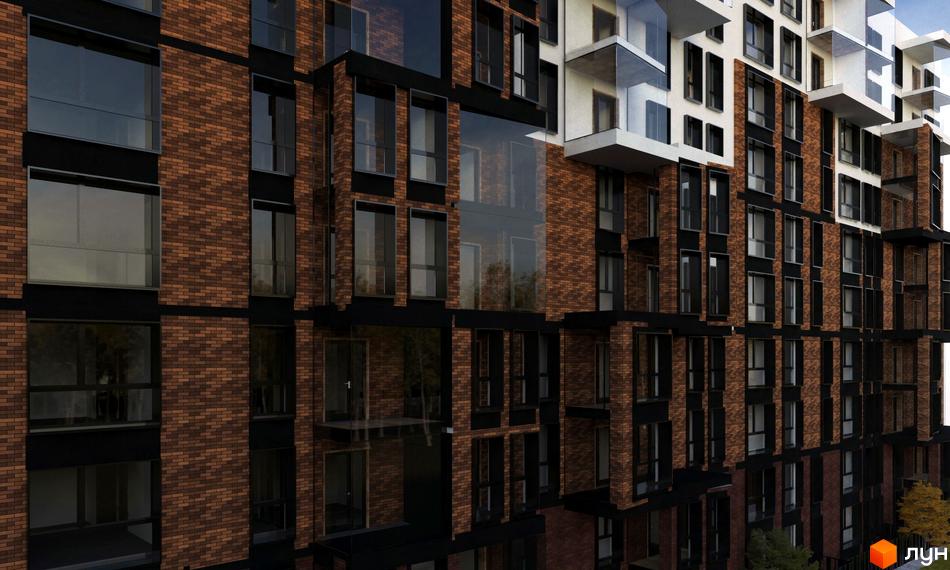 Зображення фасаду будинку Житлового комплексу Янтарний з великими вікнами та цегляним оздобленням. Архітектура новобудови.