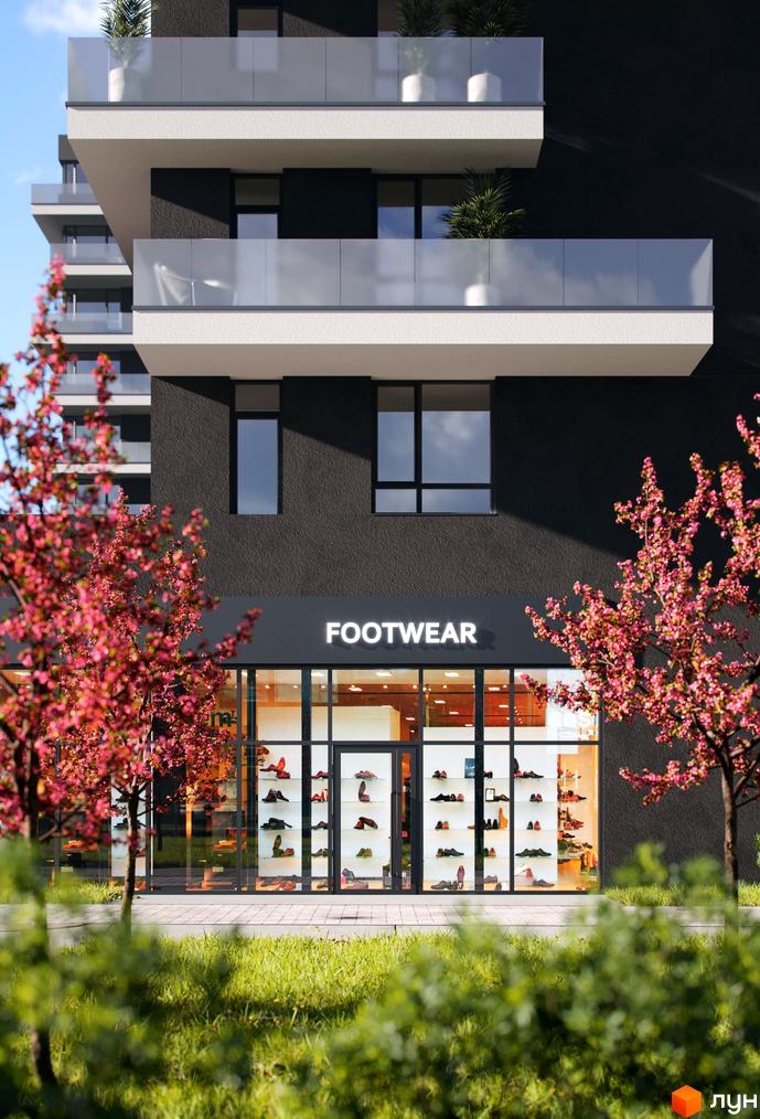 Зовнішній вигляд будинку Житлового комплексу Avalon Flex з магазином внизу. Навколо будинку дерева та зелена територія.