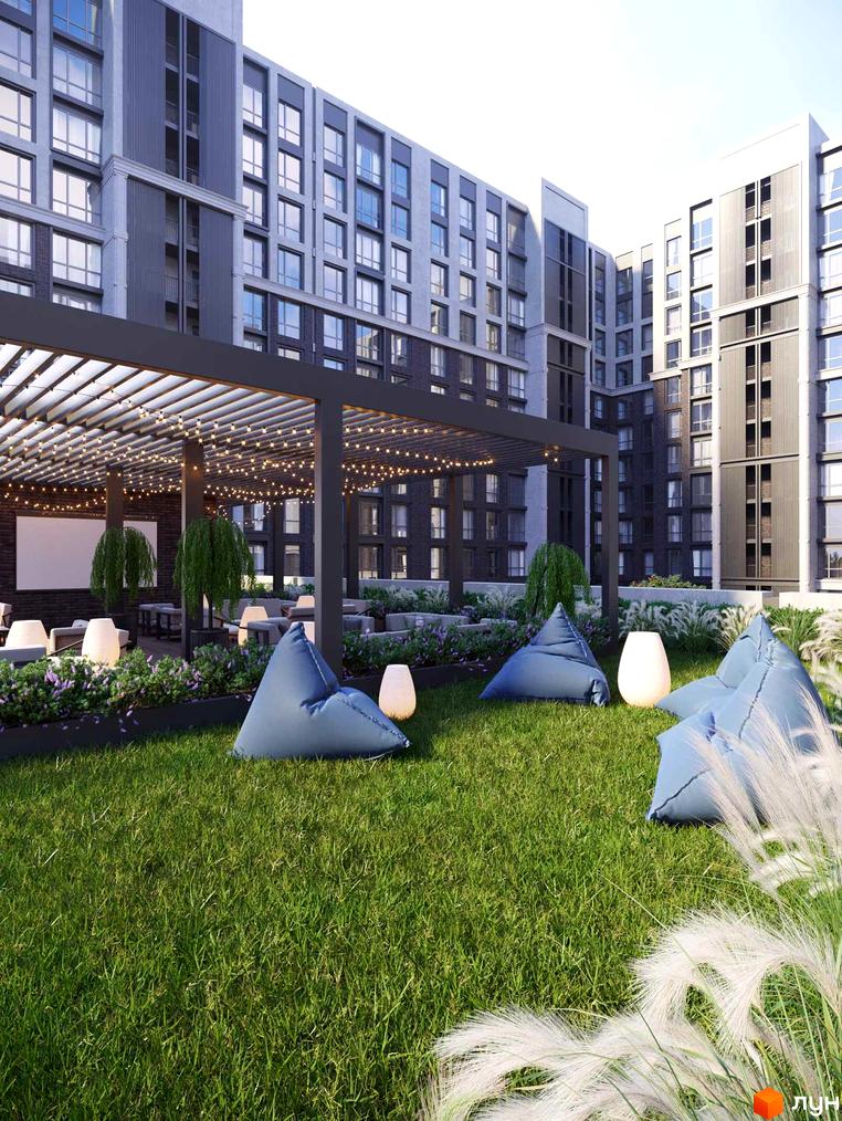 Житловий комплекс GENEVE: фасади будівель з великою кількістю вікон та затишна прибудинкова територія з місцями для відпочинку та озелененням.