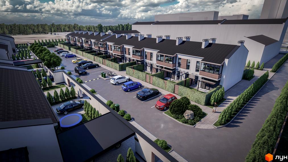 Зображення Житлового району Dresden з виглядом на таунхауси та парковку. Навколо будинків зелені насадження.