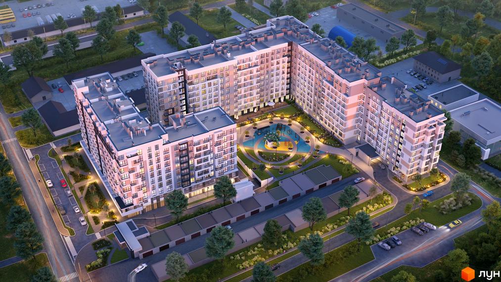 Житловий комплекс AUROOM CITY: аерофотознімок багатосекційних будівель зі світлими фасадами та внутрішнім двором з дитячим майданчиком і зеленими зонами.