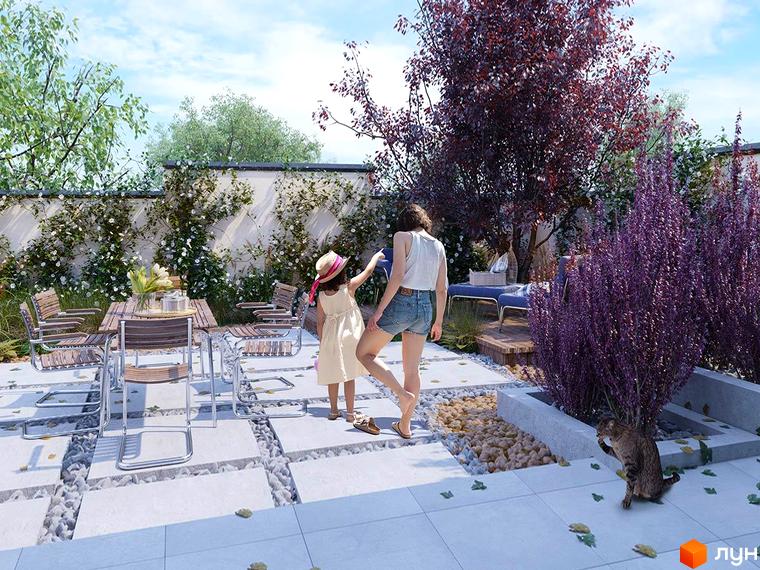 Новобудова Ivory: доглянутий двір з терасою, обідньою зоною та пишними зеленими насадженнями.