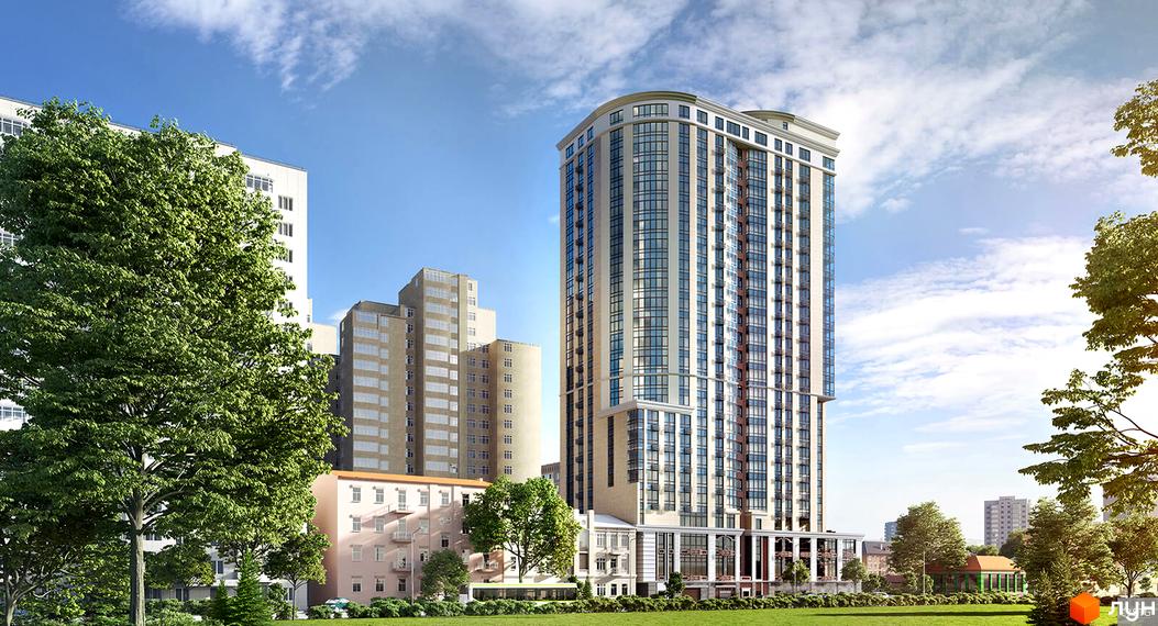 Висотна будівля житлового комплексу Володимирський з панорамними вікнами на фоні неба. На передньому плані зелена трава та дерева.