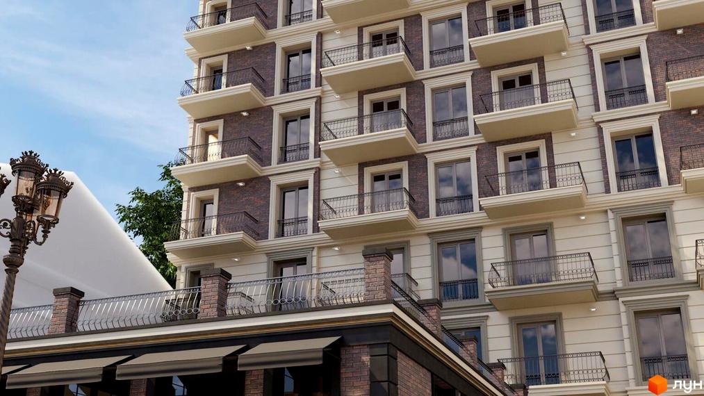 Новобудова Будинок на Міщанській: багатоповерховий будинок зі світлими фасадами, цегляними вставками та балконами з металевими перилами. Видно вуличний ліхтар.