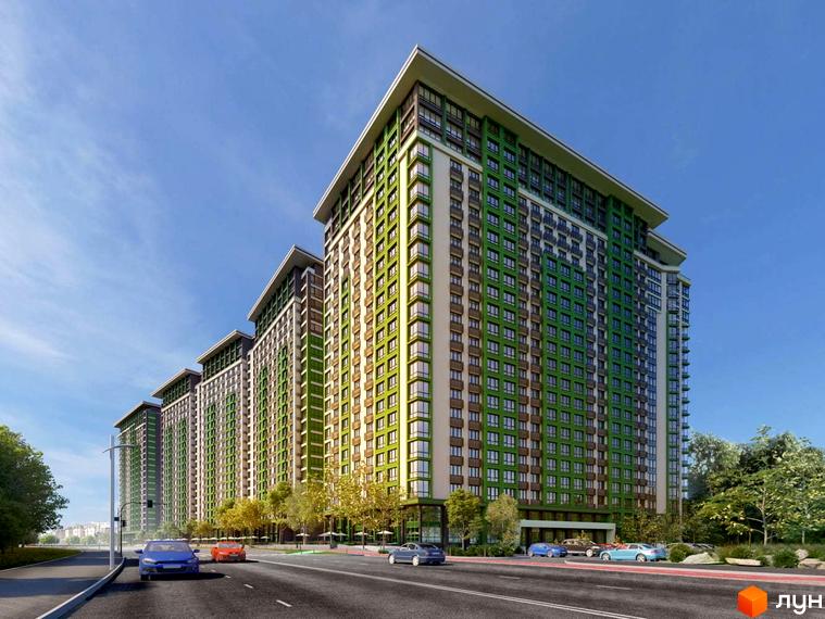 Житловий комплекс LIKO-GRAD Perfect Town з фасадами у зелених тонах. На передньому плані дорога з автомобілями, навколо будинку зелені насадження.