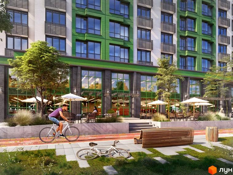 Зображення фасаду будівлі житлового комплексу LIKO-GRAD Perfect Town. На передньому плані велосипедна доріжка та лавки для відпочинку.