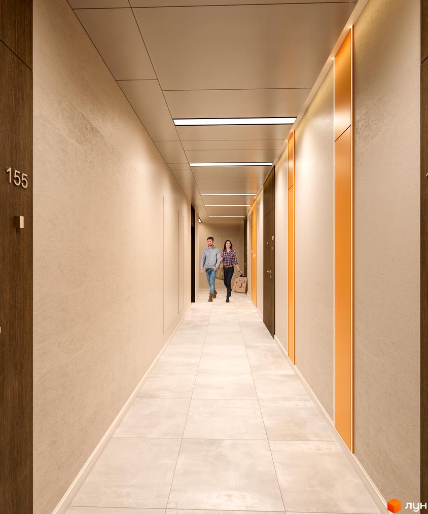 Внутрішній коридор Житлового комплексу OK'LAND з світлими стінами, плитковою підлогою та лінійним освітленням. Видно дерев'яні двері квартир та декоративні панелі.