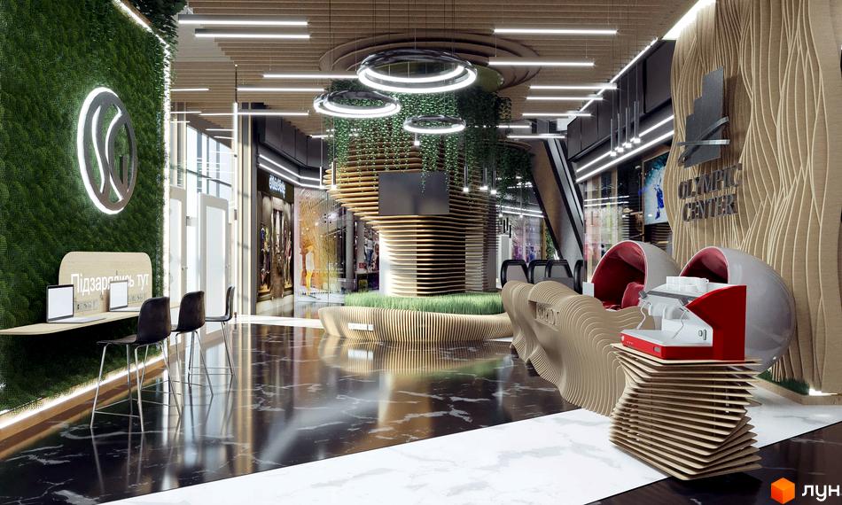 Просторий інтер'єр Житлового комплексу Olympic Park з елементами дерева, зеленими стінами, зонами відпочинку та зарядки гаджетів.