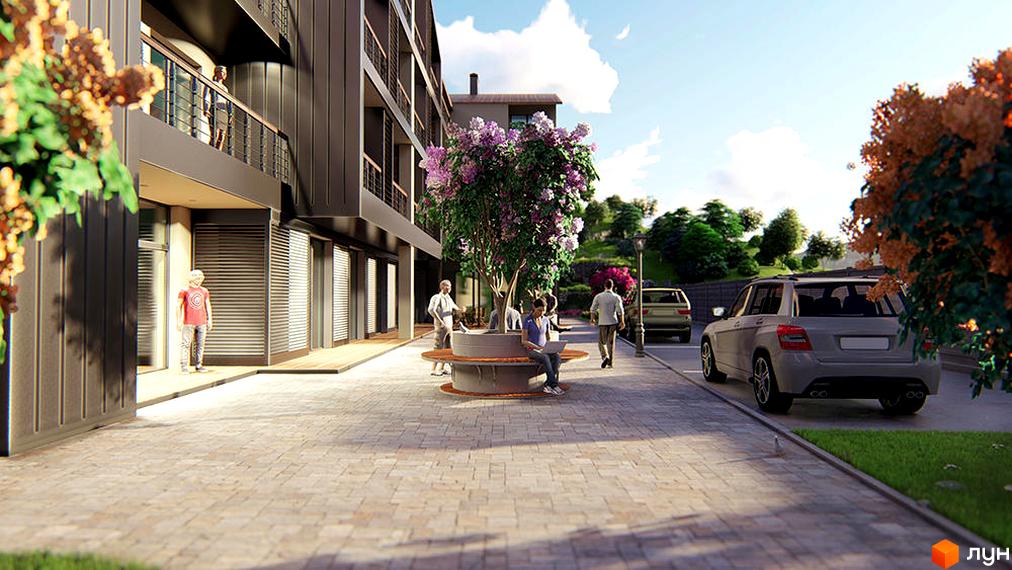 Зображення житлового комплексу Shayan. Фасад будівлі з темним оздобленням, поруч облаштована зона відпочинку з лавками та деревом.