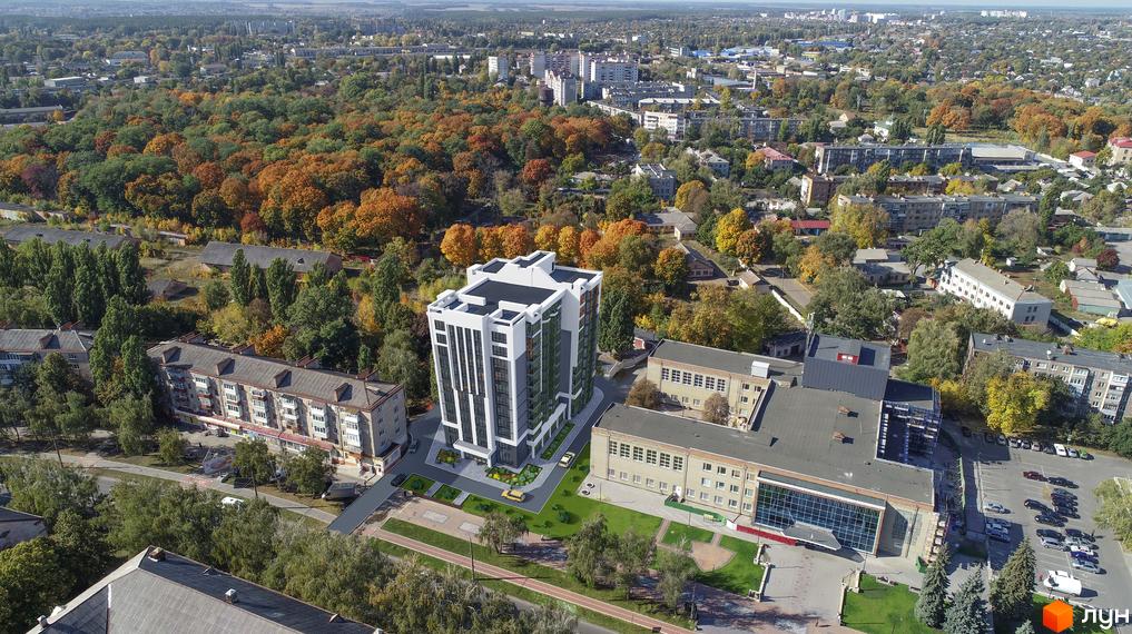 Багатоповерхова Новобудова на вул. Мазепи, 23, з біло-зеленим фасадом та доглянутою прибудинковою територією.