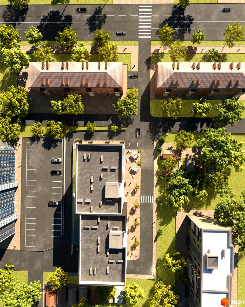 Вид зверху на будівлі ЖК Forward з коричневими дахами та прибудинковою територією з деревами, парковкою та дорогою з пішохідними переходами.