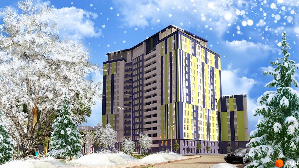 Багатоповерховий будинок у зимовому пейзажі. Навколо будинку засніжені дерева та блакитне небо з хмарами.