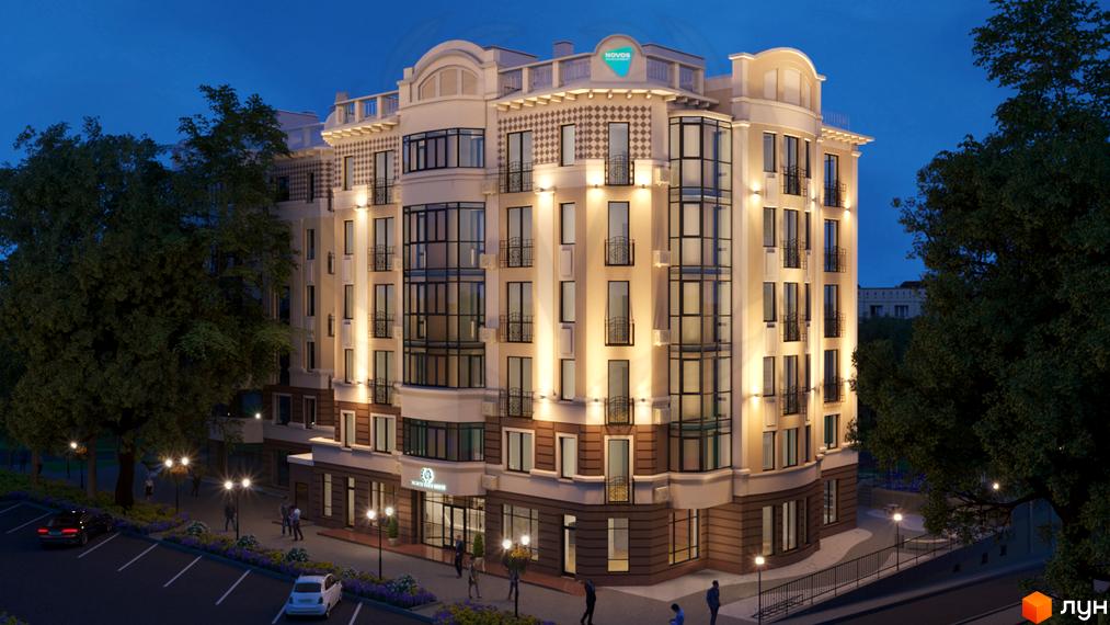 Житловий комплекс Victory Club House з фасадами, оздобленими декоративними елементами та підсвічуванням, оточений деревами та освітленими ліхтарями вулицями.