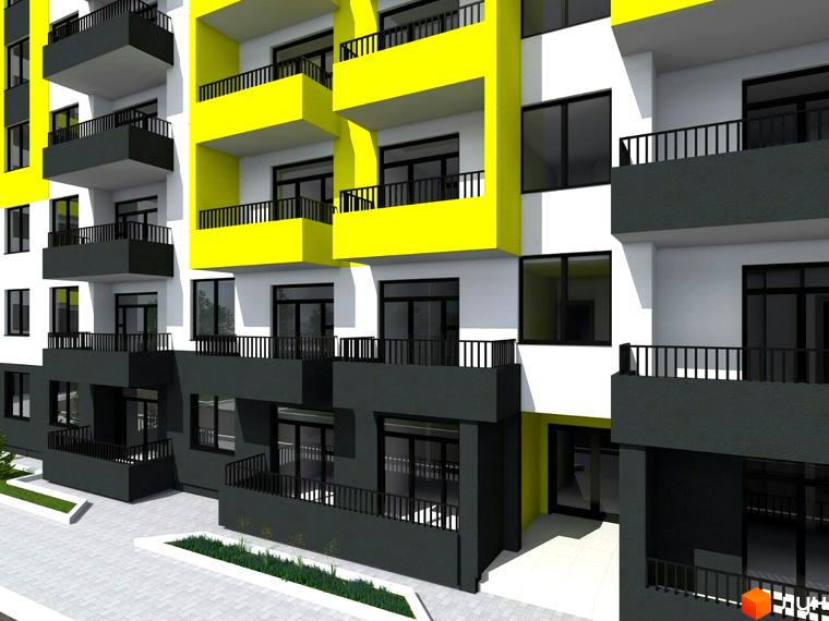 Сучасний житловий комплекс з яскравими жовтими фасадами та темними балконами. Навколо будинку облаштована прибудинкова територія з бруківкою та зеленню.